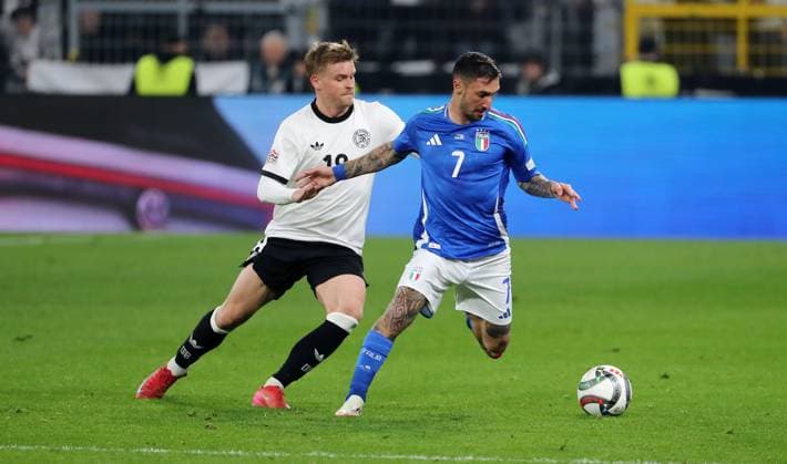 Maximilian Mittelstädt, Jonathan Burkardt duel match scene action sport football soccer Nations League international match national team DFB men season 2024 2025 23 03 2025 Germany GER vs Italy ITA DFL regulations prohibit any use of photographs as image sequences and or quasi video