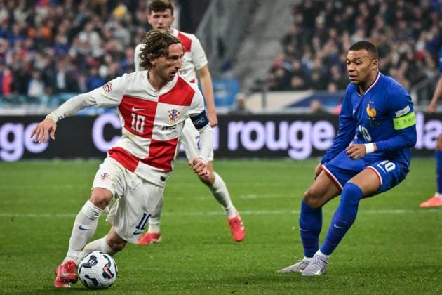 Nations League - France v Croatia - FA Croatia’s Luka Modric controls the ball next to French forward Kylian Mbappe during the UEFA Nations League football match between France and Croatia at the Stade de France stadium in Saint-Denis, north of Paris on March 23, 2025. Photo by Firas Abdullah ABACAPRESS.COM Metz Lorraine France  Copyright: xAbdullahxFiras ABACAx