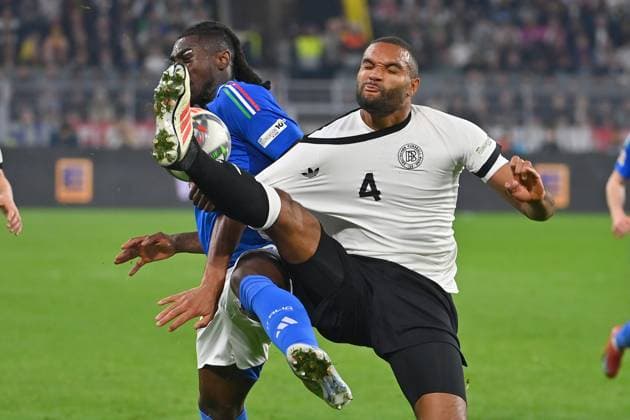 Jonathan Tah GER , action,duel against Moise KEAN ITA Soccer Nations League quarterfinal Germany GER Italy ITA 3 3 on 23 03 2025, Signal Iduna Park