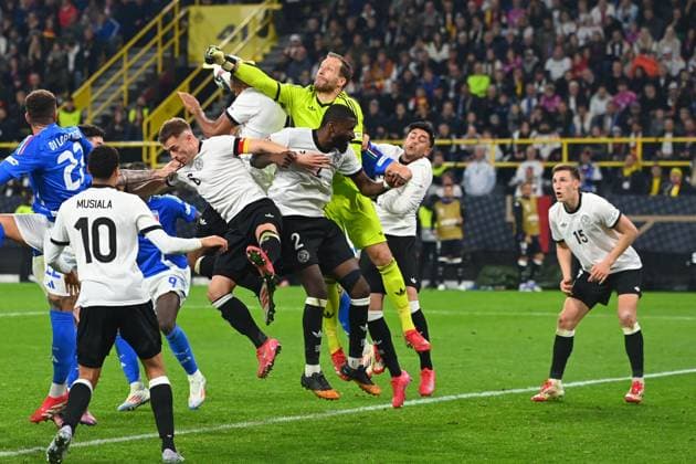 Penalty area scene with goalkeeper Oliver BAUMANN GER ,Antonio Ruediger GER ,Jonathan Tah GER ,Joshua KIMMICH GER ,Nadiem AMIRI GER ,re Nico SCHLOTTERBECK GER ,Action Soccer Nations League Quarter Final Germany GER Italy ITA 3 3 on 23 03 2025, Signal Iduna Park