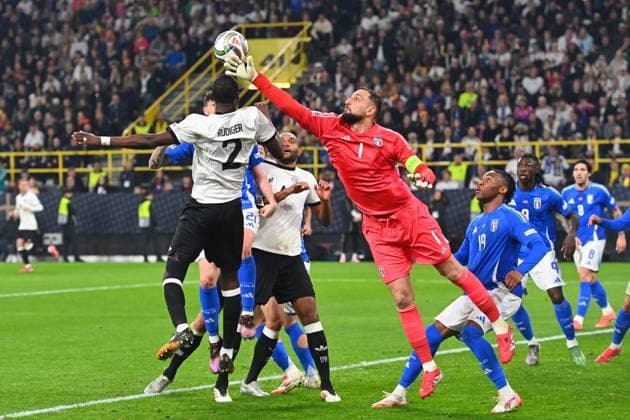 Penalty area scene from left Antonio Ruediger GER ,Goalkeeper Gianluigi DONNARUMMA ITA ,Destiny UDOGIE ITA , Action Soccer Nations League Quarterfinal Germany GER Italy ITA 3 3 on 23 03 2025, Signal Iduna Park