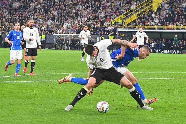 Alessandro BUONGIORNO ITA fouls Tim KLEINDIENST GER for penalty kick,penalty kick action,tackle,foul Soccer Nations League quarter-final Germany GER Italy ITA 3 3 on 23 03 2025, Signal Iduna Park