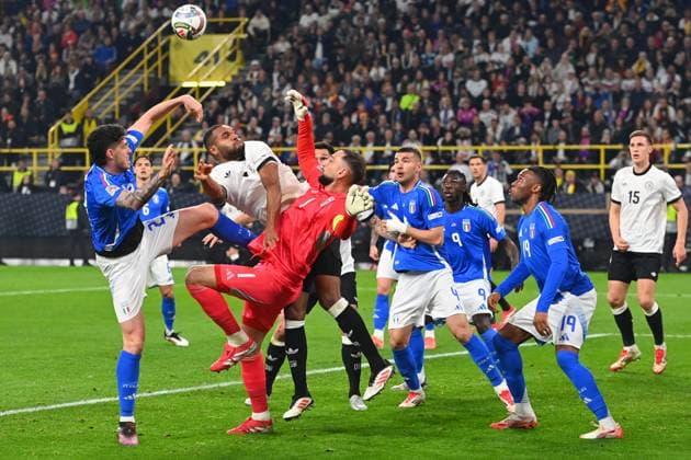 Penalty area scene with Jonathan Tah GER ,action,duel against goalkeeper Gianluigi DONNARUMMA ITA and Alessandro BASTONI ITA Soccer Nations League quarter final Germany GER Italy ITA 3 3 on 23 03 2025, Signal Iduna Park