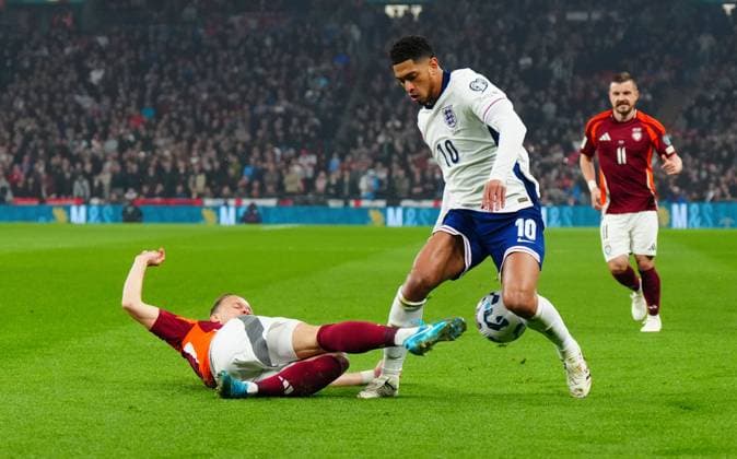 Alvis Jaunzems of Latvia tackles Jude Bellingham of England England v Latvia, FIFA 2026 World Cup Qualifying, Group K, Football, Wembley Stadium, London, UK - 24 Mar 2025 EDITORIAL USE ONLY No use with unauthorised audio, video, data, fixture lists, club league logos or live services. Online in-match use limited to 120 images, no video emulation. No use in betting, games or single club league player publications. Copyright: xJavierxGarcia Shutterstockx 15219744n