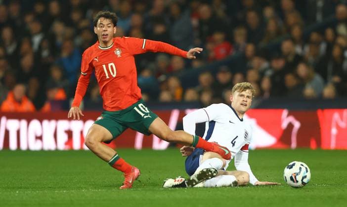 Pedro Santos of Portugal Under 21 and Jarrad Branthwaite of England Under 21 in action England U21, U 21 v Portugal U21, International Friendly, Länderspiel, Nationalmannschaft Football, The Hawthorns, West Bromwich, UK - 24 Mar 2025 EDITORIAL USE ONLY No use with unauthorised audio, video, data, fixture lists, club league logos or live services. Online in-match use limited to 120 images, no video emulation. No use in betting, games or single club league player publications. Copyright: xKieranxMcManus Shutterstockx 15219750ab