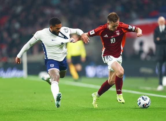 England v Latvia, 2026 World Cup Qualifier, Wembley Stadium, Football, London, UK - 24 Mar 2025 JÄnis Ikaunieks of Latvia holds off Reece James of England during the 2026 World Cup Qualifier at Wembley Stadium London Wembley Stadium London GBR, UK NEWSPAPERS OUT Copyright: xMarkxGreenwoodx