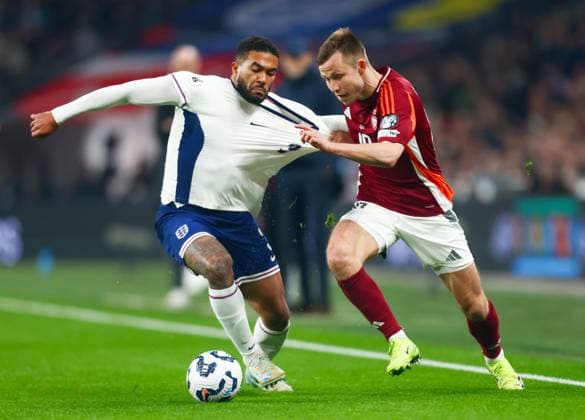 England v Latvia, 2026 World Cup Qualifier, Wembley Stadium, Football, London, UK - 24 Mar 2025 JÄnis Ikaunieks of Latvia holds off Reece James of England during the 2026 World Cup Qualifier at Wembley Stadium London Wembley Stadium London GBR, UK NEWSPAPERS OUT Copyright: xMarkxGreenwoodx
