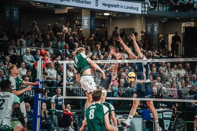 Volleyball Men Season 2024 2025 Volleyball Bundesliga Playoff Quarterfinals Match 1 SVG Lüneburg vs FT 1844 Freiburg 24 03 2025 Charles Figy 14 FT 1844 Freiburg is stopped in the block by Michael Patrick Wright 3 SVG Lüneburg and Joscha Kunstmann 7 SVG Lüneburg Lüneburg LKH Arena Niedersachsen Germany