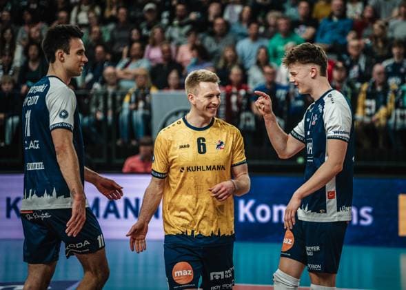 Volleyball Men Season 2024 2025 Volleyball Bundesliga Playoff Quarterfinals Game 1 SVG Lüneburg vs FT 1844 Freiburg 24 03 2025 Theo Mohwinkel 8 SVG Lüneburg and Gage Thomas Worsley 6 SVG Lüneburg laugh Lüneburg LKH Arena Niedersachsen Germany