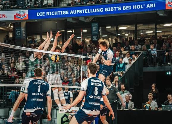 Volleyball Men Season 2024 2025 Volleyball Bundesliga Playoff Quarterfinals Game 1 SVG Lüneburg vs FT 1844 Freiburg 24 03 2025 Oskar Alve Espeland 9 SVG Lüneburg scores against the Freiburg double block Lüneburg LKH Arena Niedersachsen Germany