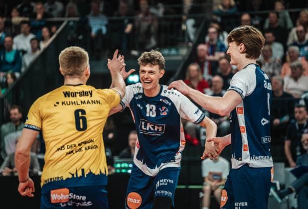 Volleyball Men Season 2024 2025 Volleyball Bundesliga Playoff Quarterfinals Game 1 SVG Lüneburg vs FT 1844 Freiburg 24 03 2025 Neo Laumann 13 SVG Lüneburg cheers with Gage Thomas Worsley 6 SVG Lüneburg and Oskar Alve Espeland 9 SVG Lüneburg Lüneburg LKH Arena Niedersachsen Germany