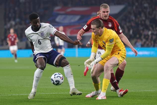 England v Latvia 2026 FIFA World Cup, WM, Weltmeisterschaft, Fussball Qualifiers Vladislavs Gutkovskis of Latvia capitalises on a mix up between Jordan Pickford of England and Marc Guehi of England but misses the target with his shot during the 2026 FIFA World Cup Qualifiers Group K match at Wembley Stadium, London UK Newspapers OUT Copyright: xPaulxChestertonx FIL-21625-0046