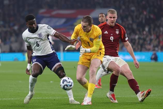 England v Latvia 2026 FIFA World Cup, WM, Weltmeisterschaft, Fussball Qualifiers Vladislavs Gutkovskis of Latvia capitalises on a mix up between Jordan Pickford of England and Marc Guehi of England but misses the target with his shot during the 2026 FIFA World Cup Qualifiers Group K match at Wembley Stadium, London UK Newspapers OUT Copyright: xPaulxChestertonx FIL-21625-0047
