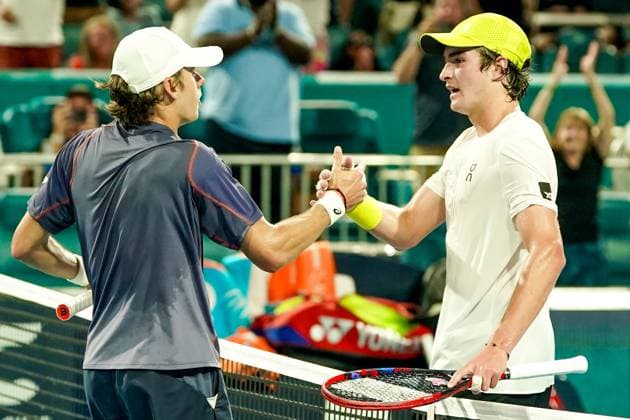 March 24, 2025, Miami, Florida, USA: Alex deMinaur (AUS) shakes hands with Joao Fonseca (BRA) after the men s singles third round match at the 2025 Miami Open presented by Itau at Hard Rock Stadium. Miami USA - ZUMAw109 20250324_fap_w109_076 Copyright: xDebbyxWongx