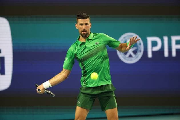 March 25, 2025, Miami Gardens, Florida, United States Of America: MIAMI GARDENS, FLORIDA - MARCH 25: Novak Djokovic of Serbia defeats Lorenzo Musetti of Italy in the fourth round of the men s singles during Day 8 of the Miami Open at Hard Rock Stadium on March 25, 2025 in Miami Gardens, Florida....People: Novak Djokovic Miami Open 2025 - Day 8  - ZUMAs214 20250325_ada_s214_031 Copyright: xSMGx