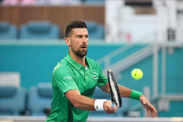 March 25, 2025, Miami Gardens, Florida, United States Of America: MIAMI GARDENS, FLORIDA - MARCH 25: Novak Djokovic of Serbia defeats Lorenzo Musetti of Italy in the fourth round of the men s singles during Day 8 of the Miami Open at Hard Rock Stadium on March 25, 2025 in Miami Gardens, Florida....People: Novak Djokovic Miami Open 2025 - Day 8  - ZUMAs214 20250325_ada_s214_096 Copyright: xSMGx