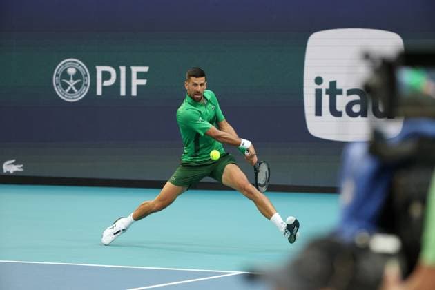 March 25, 2025, Miami Gardens, Florida, United States Of America: MIAMI GARDENS, FLORIDA - MARCH 25: Novak Djokovic of Serbia defeats Lorenzo Musetti of Italy in the fourth round of the men s singles during Day 8 of the Miami Open at Hard Rock Stadium on March 25, 2025 in Miami Gardens, Florida....People: Novak Djokovic Miami Gardens United States Of America - ZUMAs214 20250325_ada_s214_122 Copyright: xSMGx