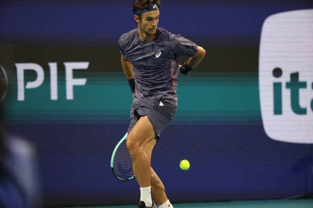 March 25, 2025, Miami Gardens, Florida, United States Of America: MIAMI GARDENS, FLORIDA - MARCH 25: Novak Djokovic of Serbia defeats Lorenzo Musetti of Italy in the fourth round of the men s singles during Day 8 of the Miami Open at Hard Rock Stadium on March 25, 2025 in Miami Gardens, Florida....People: Lorenzo Musetti Miami Gardens United States Of America - ZUMAs214 20250325_ada_s214_149 Copyright: xSMGx