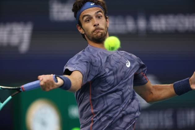 March 25, 2025, Miami Gardens, Florida, United States Of America: MIAMI GARDENS, FLORIDA - MARCH 25: Novak Djokovic of Serbia defeats Lorenzo Musetti of Italy in the fourth round of the men s singles during Day 8 of the Miami Open at Hard Rock Stadium on March 25, 2025 in Miami Gardens, Florida....People: Lorenzo Musetti Miami Gardens United States Of America - ZUMAs214 20250325_ada_s214_150 Copyright: xSMGx
