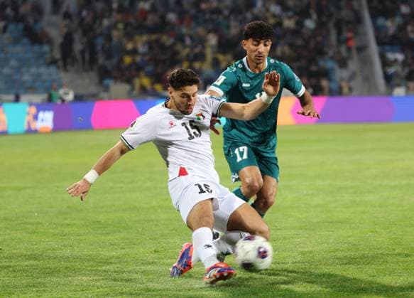 Palestine v Iraq - AFC Asian Qualifiers 2026 Michael Termanini (15) of Palestine and Ali Jassim (17) of Iraq compete during the 2026 FIFA World Cup, WM, Weltmeisterschaft, Fussball qualification match between Palestine and Iraq at Amman International Stadium in Amman, Jordan, on March 25, 2025. AMMAN Jordan  Copyright: xAmeenxAhmedx originalFilename:alameen-notitle250325_npWgt.jpg