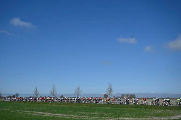 Classic Brugge De Panne 2025 cycling race DE PANNE, BELGIUM - MARCH 26 : illustration picture peloton during the Men Elite UCI World Tour 49th Classic Brugge De Panne cycling race with start in Brugge and finish in De Panne (195,6 km) on March 26, 2025 in De Panne, Belgium, 26 03 2025 ( Motordriver Kenny Verfaillie & De Panne Belgium  Copyright: xNicoxVereeckenx