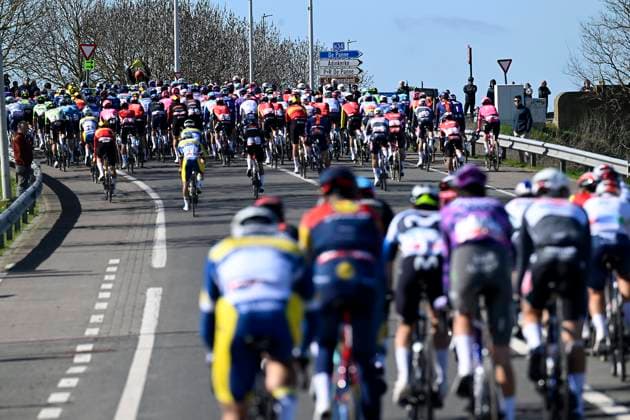 Classic Brugge De Panne 2025 cycling race DE PANNE, BELGIUM - MARCH 26 : illustration picture peloton during the Men Elite UCI World Tour 49th Classic Brugge De Panne cycling race with start in Brugge and finish in De Panne (195,6 km) on March 26, 2025 in De Panne, Belgium, 26 03 2025 ( Motordriver Kenny Verfaillie & De Panne Belgium  Copyright: xNicoxVereeckenx
