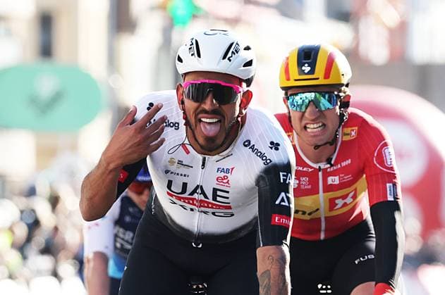 Colombian Sebastian Molano of UAE Team Emirates celebrates after winning the Classic Brugge-De Panne men s elite one-day cycling race, 195,6 km from Brugge to De Panne, Wednesday 26 March 2025. KURTxDESPLENTER  x115910405x