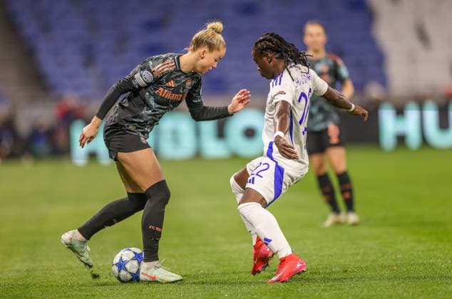 FRA, Lyon, Olympique Lyon vs FC Bayern Munich, WomenÂs Champions League, Football, UEFA, 2024 2025 season, Groupama Stadium, quarter-finals, pictured from l Giulia Gwinn FC Bayern Munich Women 7 , Tabitha Chawinga Olympique Lyon 22 DFB DFL REGULATIONS PROHIBIT ANY USE OF PHOTOGRAPHS AS IMAGE SEQUENCES AND OR QUASI VIDEO, 26 03 2025, Copyright: HMBxMedia HendrikxHamelau