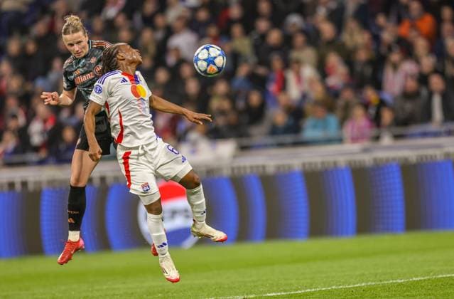FRA, Lyon, Olympique Lyon vs FC Bayern Munich, WomenÂs Champions League, Football, UEFA, 2024 2025 season, Groupama Stadium, quarter-final, in the picture from l header duel Franziska Kett FC Bayern Munich Women 20 , Melchie Dumornay Olympique Lyon 6 DFB DFL REGULATIONS PROHIBIT ANY USE OF PHOTOGRAPHS AS IMAGE SEQUENCES AND OR QUASI VIDEO, 26 03 2025, Copyright: HMBxMedia HendrikxHamelau