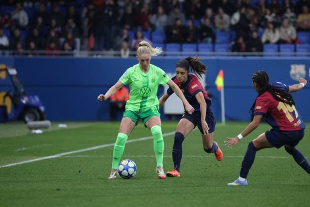 Spain - UEFA Women s Champions League - FC Barcelona, Barca vs VfL Wolfsburg - 27 03 2025 SPAIN, BARCELONA, MARCH 27. Rebecka Blomqvist of Wolfsburg is challenged by Jana Fernandez of FC Barcelona during the UEFA Women s Champions League quarterfinals second leg match between FC Barcelona and VfL Wolfsburg on March 27, 2024 at Estadi Johan Cruyff in Barcelona, Spain. Photo by Manuel Blondeau AOP.Press Barcelona Estadi Johan Cruyff Catalunya Spain Copyright: x ManuelxBlondeau AOP.Pressx AOP20250327 0003