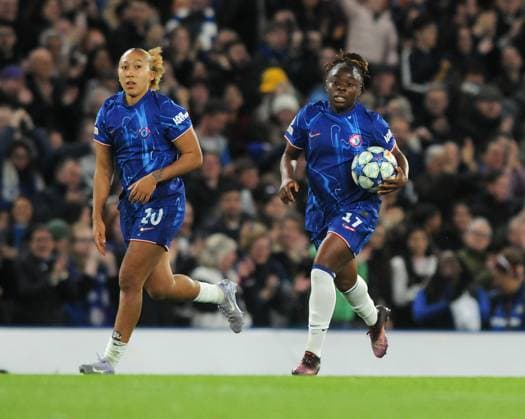 Football - 2024 2025 UEFA Women™s Champions League - Quarter-Final - Second Leg - Chelsea vs Manchester City - Stamford Bridge - Thursday 27th March 2025. Sandy Baltimore of Chelsea runs back to the half way line with the ball after scoring the first goal with Lauren James (left) 
