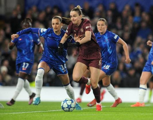 Football - 2024 2025 UEFA Women™s Champions League - Quarter-Final - Second Leg - Chelsea vs Manchester City - Stamford Bridge - Thursday 27th March 2025. Vivianne Miedema of Man City and Nathalie Bjorn of Chelsea 