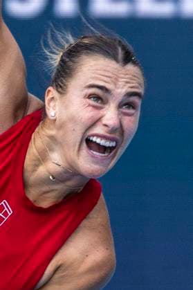 Aryna Sabalenka of Belarus serves to Jasmine Paolini of Italy in the first semifinal match on the stadium court at the Miami Open in the Hard Rock Stadium in Miami Gardens, Florida, on Thursday, March 27, 2025. Sabalenka defeated Paolini 6-2, 6-2.  MIA20250327119 GARYxIxROTHSTEIN