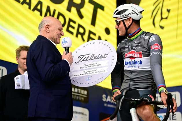 E3 Saxo Classic 2025 Cycling Race Harelbeke, Belgium - March 28 : Van Der Poel Mathieu (NED) of Alpecin - Deceuninck receives presents at the start of the Men Elite UCI World Tour 68th E3 Saxo Classic cycling race of 208 kms with start in Harelbeke and finish in Harelbeke on March 28, 2025 in Harelbeke, Belgium, 28 03 2025 ( Motordriver Kenny Verfaillie - Harelbeke Belgium  Copyright: xPeterxDexVoechtx