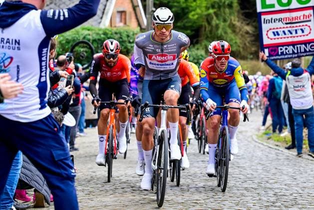 Italian Filippo Ganna of Ineos Grenadiers, Dutch Mathieu van der Poel of Alpecin-Deceuninck and Danish Mads Pedersen of Lidl-Trek pictured in action during the E3 Saxo Bank Classic one day cycling race, 208,8 km from and to Harelbeke, on Friday 28 March 2025. DIRKxWAEM  x116520827x