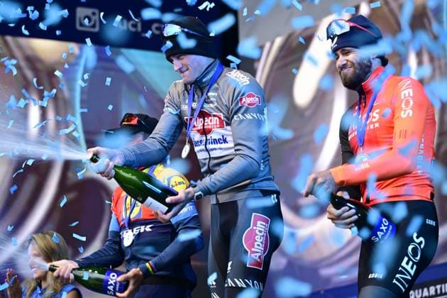Austrian Tobias Bayer of Alpecin-Deceuninck, Dutch Mathieu van der Poel of Alpecin-Deceuninck and Belgian Xandro Meurisse of Alpecin-Deceuninck pictured on the podium after the E3 Saxo Bank Classic one day cycling race, 208,8 km from and to Harelbeke, on Friday 28 March 2025. DIRKxWAEM  x116568495x