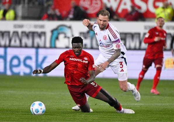 Football 2 Bundesliga Season 2024 25 1 FC Kaiserslautern 29 03 2025 Fritz Walter Stadion 1 FC Kaiserslautern fck Fortuna Düsseldorf dus Ragnar ACHE 1 FC Kaiserslautern is fouled by Andre HOFFMANN Fortuna Düsseldorf 1 FC Kaiserslautern