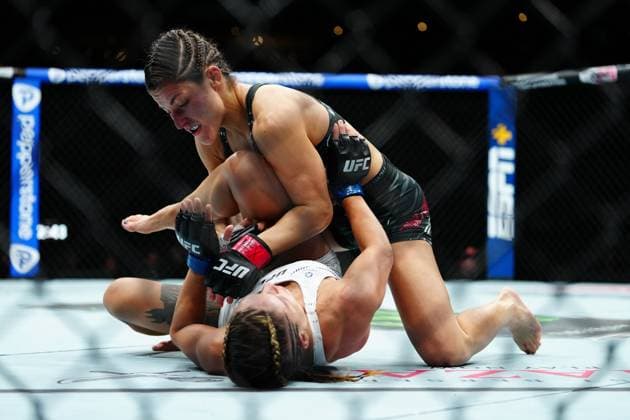 March 29, 2025, Mexico City, Mexico, Las Vegas, Nv, United States: Loopy Godinez and Julia Polastri meet in the octagon for a 3-round bout at UFC Fight Night - Moreno vs Erceg at Arena CDMX on March 29, 2025 in Mexico City, Mexico ( PxImages) Mexico City, Mexico United States - ZUMAp175 20250329_zsa_p175_312 Copyright: xLouisxGrassex
