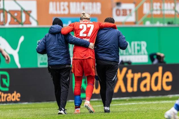 Soccer Men 2 Bundesliga 27 Matchday Season 2024 2025 SpvGG Greuther Fürth vs FC Schalke 04 30 03 2025 27 Loris Karius FC Schalke 04 injured in collision with 30 Felix Klaus SpVgg Greuther Fürth DFL regulations prohibit any use of photographs as image sequences and or quasi video Fürth Sportpark Ronhof Thomas Sommer Bayern Germany