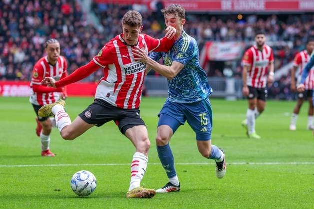 2025-03-30 PSV v AFC Ajax - Dutch Eredivisie EINDHOVEN, NETHERLANDS - MARCH 30: Guus Til of PSV, Youri Baas of AFC Ajax during the Dutch Eredivisie match between PSV and AFC Ajax at Philips Stadion on March 30, 2025 in Eindhoven, Netherlands. Eindhoven Philips Stadion Netherlands Content not available for redistribution in The Netherlands directly or indirectly through any third parties. Copyright: xBenxGalx