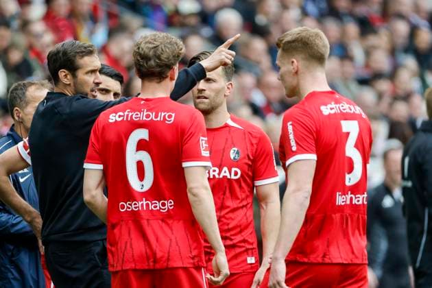 Julian Schuster SC Freiburg, Coach , Vincenzo Grifo SC Freiburg, 32 , Patrick Osterhage SC Freiburg, 06 , Lucas Höler, Holer SC Freiburg, 09 and Philipp Lienhart SC Freiburg, 03 in dialog , Football, 1 Bundesliga, Matchday 27, 2024 2025, SC Freiburg vs 1 FC Union Berlin, 30 03 2025, Europa Park Stadion, Freiburg im Breisgau, Germany DFL REGULATIONS PROHIBIT ANY USE OF PHOTOGRAPHS AS IMAGE SEQUENCES AND OR QUASI VIDEO Freiburg im Breisgau Europa Park Stadion Baden Württemberg Germany Copyright: xGrantxHubbsx