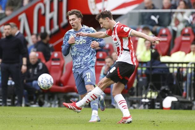 EINDHOVEN, 30-03-2025, Philips Stadium, Dutch Eredivisie Football season 2024 2025 , match between PSV and Ajax 0-2. Milk Godts and Olivier Boscagli PSV - Ajax  x28532534x Copyright: