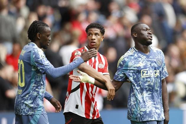 EINDHOVEN, 30-03-2025, Philips Stadium, Dutch Eredivisie Football season 2024 2025 , match between PSV and Ajax 0-2 . Bertrand Traore, Ryan Flamingo and Brian Brobbey. PSV - Ajax  x28532706x Copyright:
