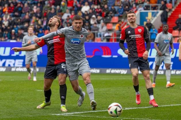 Ingolstadt, Germany 30 March 2025 3 Liga 2024 2025 FC Ingolstadt 04 vs Viktoria Köln In the picture from left in duel Yannick Deichmann FCI , Niklas May Koeln and Gustav Christensen FCI DFB regulations prohibit any use of photographs as image sequences and or quasi video Audi Sportpark Bayern Copyright: xFotostandx xSchäferx