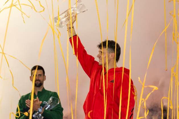 Jakub Mensik from the Czachia holds the Butch Buchholtz winning trophy after defeating Novak Djokovic from Serbia in the men s championship match on the stadium court at the Miami Open in the Hard Rock Stadium in Miami Gardens, Florida, on Sunday, March 30, 2025. Mensik defeated Djokovic 7-6 (4), 7-6(4).  MIA20250330105 GARYxIxROTHSTEIN