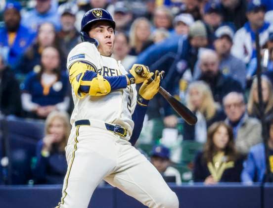 Milwaukee Brewers outfielder Christian Yelich reacts as he is hit by a pitch thrown by Kansas City Royals starting pitcher Kris Bubic in the third inning of the MLB, Baseball Herren, USA baseball game between the Kansas City Royals and the Milwaukee Brewers at American Family Field in Milwaukee, Wisconsin on Monday, March 31, 2025. The game is the Brewers 2025 season home opener.  MIL20250331816 TANNENxMAURY