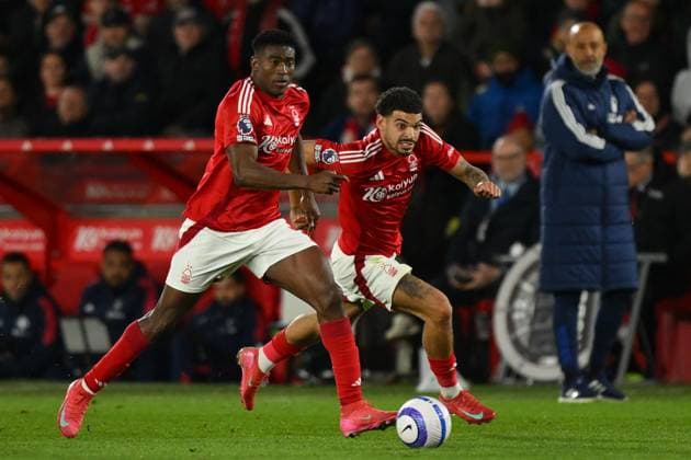 Nottingham Forest FC v Manchester United, ManU FC - Premier League Taiwo Awoniyi of Nottingham Forest looks on with Morgan Gibbs-White of Nottingham Forest in support during the Premier League match between Nottingham Forest and Manchester United at the City Ground in Nottingham, England, on April 1, 2025. Nottingham Nottinghamshire United Kingdom  Copyright: xMIxNewsx originalFilename:fletcher-nottingh250401_np0Ta.jpg