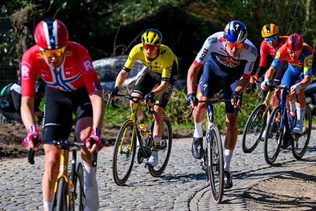 Norwegian Soren Waerenskjold of Uno-X Mobility, American Matteo Jorgenson of Team Visma-Lease a Bike and Dutch Mick Van Dijke of RedBull-BORA-hansgrohe pictured in action during the men elite race of the Dwars Door Vlaanderen cycling event, 184,2km from Roeselare to Waregem, Wednesday 02 April 2025. POOLxTIMxDExWAELE  x118285100x