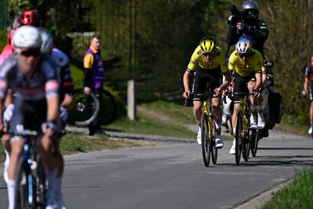 Dwars door Vlaanderen 2025 - Men Elite WAREGEM, BELGIUM - APRIL 02 : Benoot Tiesj (BEL) of Team Visma - Lease a Bike and Van Aert Wout (BEL) of Team Visma pictured during the 79th edition of the UCI World Tour Dwars door Vlaanderen Men Elite cycling race with start in Roeselare and finish in Waregem after 184,2 km on April 2, 2025 in Waregem, Belgium, 02 04 2025 ( motor drive Kenny Verfaillie - Waregem Belgium  Copyright: xJanxDexMeuleneirx
