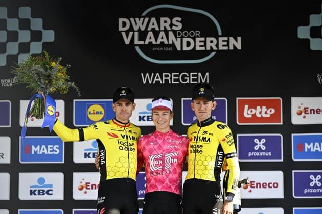 Belgian Wout van Aert of Team Visma-Lease a Bike, American Neilson Powless of EF Education-EasyPost and Belgian Tiesj Benoot of Team Visma-Lease a Bike celebrate on the podium of the men elite race of the Dwars Door Vlaanderen cycling event, 184,2km from Roeselare to Waregem, Wednesday 02 April 2025. JASPERxJACOBS  x118321346x